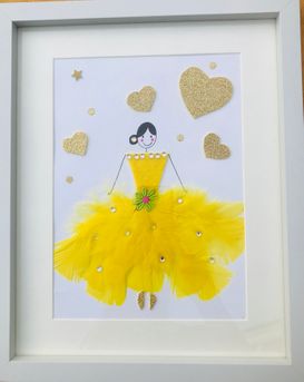Beautiful bright yellow feathered ballerina framed wall art