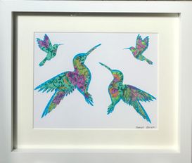 The vibrant hummingbirds framed wall art