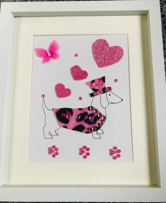 Sausage dog in pink leopardskin coat and matching hat framed wall art