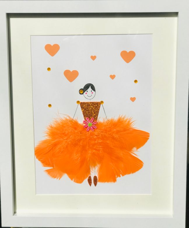 Orange feathered ballerina framed wall art