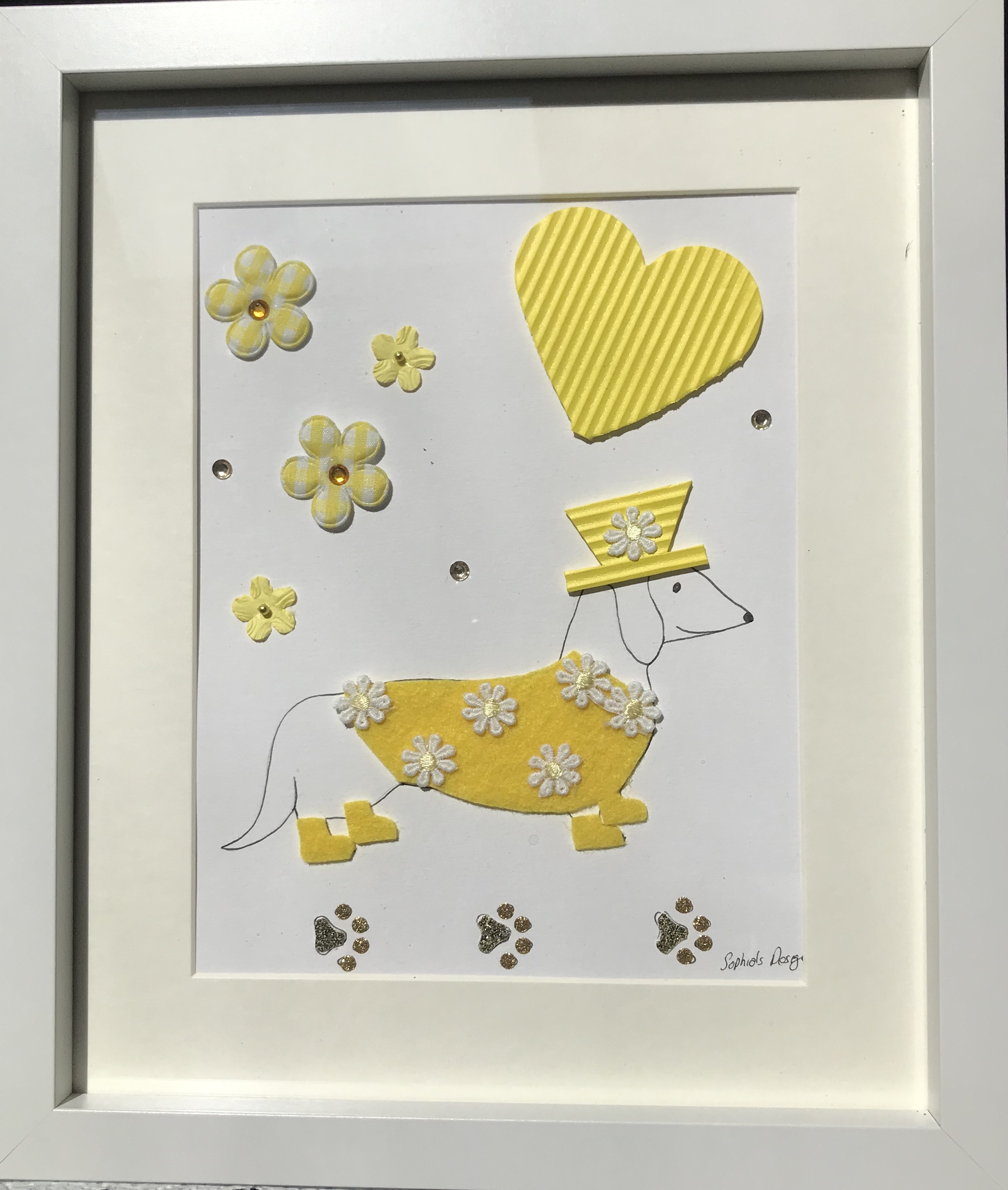 Yellow sausage dog in yellow daisy coat framed wall art
